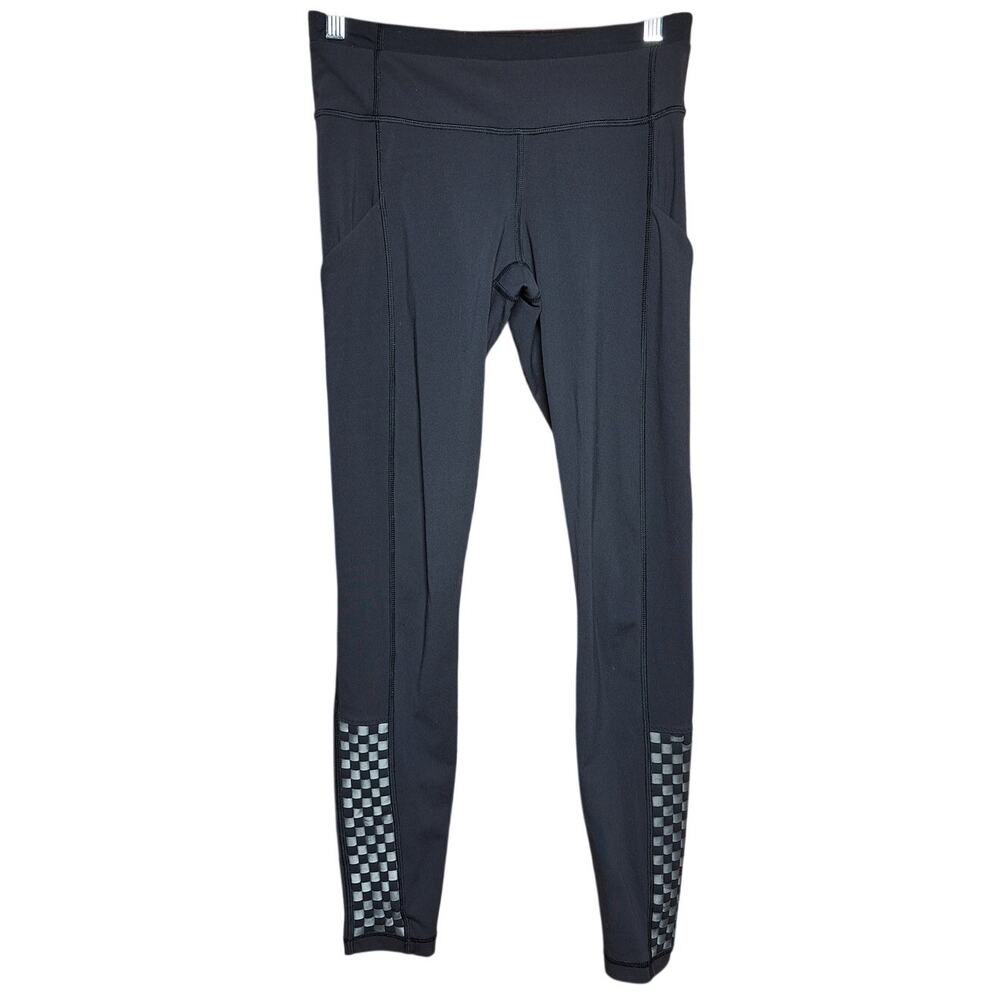 Lululemon Speed Tight II black w zip and side pockets size 4 reflective running